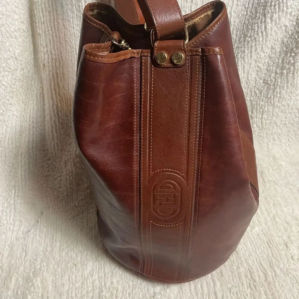 Fortune Duck vintage leather Brown sling back bucket style  bag.